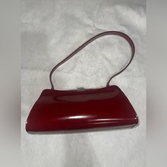 Furla Made In Italy Genuine Leather Burgundy Clutch Evening Bag For Formal Occasions, Elegant Burgundy Evening Bag, Elegant Burgundy Formal Shoulder Bag, Red Leather Evening Bag For Party, Vintage Red Bag For Formal Occasions, Elegant Red Clutch Shoulder Bag, Vintage Red Bags For Formal Occasions, Chic Burgundy Clutch Evening Bag, Classic Red Bag For Formal Occasions