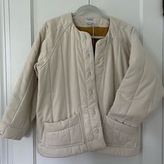 Never Worn. M/L Esby Raven Quilted Jacket, W Tags. Ivory Colored. Super Cute! White Cotton Quilted Jacket For Fall, Winter White Cotton Outerwear For Work, White Long Sleeve Casual Outerwear, Cream Cotton Outerwear For Daywear, White Long Sleeve Outerwear For Daywear, White Long Sleeve Daywear Outerwear, Beige Long Sleeve Quilted Jacket For Work, White Cotton Outerwear For Daywear, Classic Cream Outerwear For Everyday