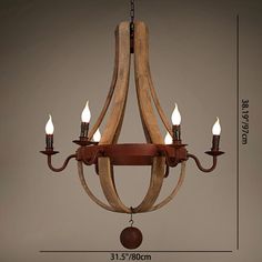 a chandelier made out of wood with three lights hanging from the bottom and one light on top