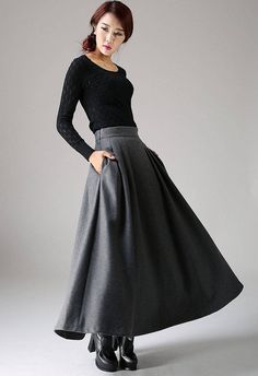 "Fluidity and elegance from this chic winter skirt. Team the wool skirt with a chunky sweater, winter boots and an over sized handbag and you're good to go, no matter what the weather throws at you! You'll really be able to turn on the charm with this versatile long pleated skirt. The gray color means that you'll match it with literally everything you own. This a line skirt will soon become a staple in your winter wardrobe collection. DETAIL * 30% wool, 30% fiber, 40% polyester * polyester linin Winter Wool Skirt, Long Skirt Winter, Long Wool Skirt, Maxi Skirt Winter, Grey Pleated Skirt, Skirt Winter, Plaid Wool Skirt, Skirt A Line, Fit And Flare Skirt