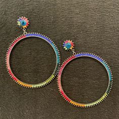 These Are Pretty Large Hoop Earrings With Beautiful Sparkly Austrian Crystals. The Colors Really Pop Because The Metal Is A Dark Gunmetal! Surgical Steel Posts 3.3” X 2.5” W Colorful Hoop Earrings For Party, Trendy Colorful Hoop Earrings For Party, Trendy Colorful Party Hoop Earrings, Adjustable Party Hoop Earrings, Multicolor Metal Hoop Earrings For Party, Multicolor Hoop Jewelry For Party, Rainbow Hoop Earrings For Party, Party Multicolor Metal Hoop Earrings, Multicolor Small Hoop Earrings For Party