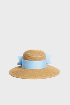 Exclusive Blue Packable Wide Bow Sunhat Chic Sun Hat With Bow For Vacation, Chic Vacation Sun Hat With Bow, Spring Vacation Boater Hat With Bow, Chic Beach Sun Hat With Bow, Summer Blue Straw Travel Hat, Summer Travel Blue Straw Hat, Chic Blue Beach Hat, Spring Vacation Sun Hat With Bow, Blue Flat Brim Sun Hat For Beach