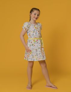 She'll love slipping into this playful A-line dress cut from 100% breathable cotton. It has an A-Line bodice, side pockets, wide round neck, puff-sleeve with elastic cuff and single button opening at the back.  Get free shipping when you spend $100 or more at www.raebenson.com 100 % Cotton Machine Wash Cold Imported Style G1104 Cute Summer Dresses For Dress-up Occasions, Fitted Short Sleeve Puff Sleeve Dress, Casual Summer Twirl Dress For Playwear, Summer Floral Print Dress For Playdate, Summer Floral Print Dress For Dress-up, Floral Print Dress For Summer Dress-up, Playful Short Sleeve Floral Dress, Casual Short Sleeve Summer Twirl Dress, Playful Sundress For Summer Playdate