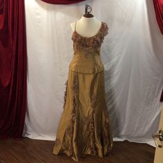 Gold Gown With Beaded Accents And Floral Lace Satin Floor-length Gown For Mother Of The Bride, Fitted Silk Mother Of The Bride Evening Dress, Fitted Ball Gown For Mother Of The Bride, Fitted Gold Mother Of The Bride Dress For Evening, Gold Fitted Mother Of The Bride Dress For Evening, Festive Evening Dress For Mother Of The Bride, Festive Mother Of The Bride Evening Dress, Fitted Silk Evening Dress For Festive Occasions, Festive Fitted Silk Evening Dress