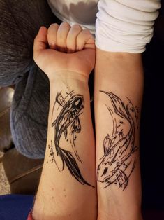 two people with matching tattoos on their arms