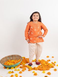 Girls Orange Embroidered Chanderi Dhoti Kurta Sets By Mr Brat now available at Trendroots Traditional Chikankari Embroidered Pant Set For Diwali, Chikankari Chanderi Pant Set For Navratri, Navratri Chikankari Chanderi Pant Set, Festive Pant Set With Chikankari Embroidery And Traditional Drape, Festive Chikankari Embroidery Pant Set, Traditional Chanderi Pant Set With Long Sleeves, Anarkali Sherwani For Puja And Diwali, Anarkali Style Sherwani For Diwali Puja, Orange Chanderi Set For Navratri