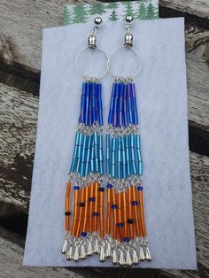 Boho style earrings, Boho drop dangle earrings, Trendy  colorful tassel beaded earrings, summer jewelry, long earrings, blue and orange colors. Stylish handmade glass tuber earrings. Hypoallergenic earrings. The earrings are complimented  by silver plated findings and decorative color drops. Made to order. Boho Style Earrings, Earrings Hypoallergenic, Earrings Summer, Earrings Trendy, Drop Dangle Earrings, Hypoallergenic Earrings, Earrings Blue, Blue And Orange, Beaded Tassels