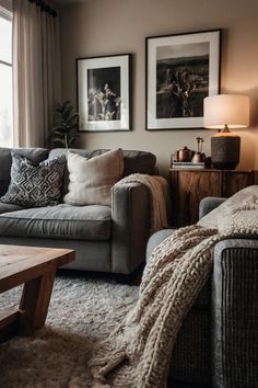 a living room filled with furniture and pictures on the wall