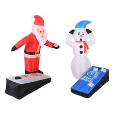 two inflatable snowmen are standing next to each other