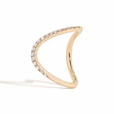 The latest addition to the curve collection inspired by the “queen of the curve”, Zaha Hadid, who was known for playing with all 360 degrees of the angle. The organic series aims to seamlessly allow the metal, stone, and skin to flow into one. This curved band is beautifully studded with pave diamonds three quarters of the way for a luxurious look. Modern Twist 14k Gold Rings With Single Cut Diamonds, Luxury White Gold Diamond Ring Si Clarity, Formal Diamond Ring With Si Clarity, Formal Si Clarity Diamond Ring, Elegant Diamond Ring With Si Clarity For Formal Occasions, Elegant Formal Diamond Ring With Si Clarity, Luxury 14k Gold Diamond Ring With Si Clarity, Elegant Diamond Ring With Si Clarity, Elegant Si Clarity Diamond Ring