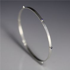 1 Stone on Shank Bangle (Sapphire) Silver Sapphire Bangle Jewelry, Silver Sapphire Bangle Bracelet, Silver Sapphire Bangle, Sapphire Stones, Family Rings, The Bangles, Mother Rings, Stone Setting, Sapphire Stone