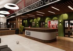 the interior of an office building with green and white walls, wood paneling, and a soccer ball on the floor