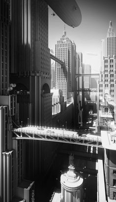 a black and white photo of a city with tall buildings