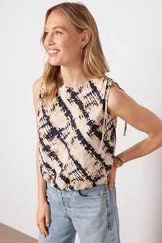 A tie shoulder detail elevates this stylish EVEREVE tank, featuring a sleeveless silhouette, elasticized hem, and back keyhole button closure. Pair with blue or white denim for a day-to-night look. Leopard Cami, Women's Blouses, Weekend Plans, Tees For Women, Front Tie Top, Tie Top, Night Looks, Striped Tank, Off Shoulder Tops