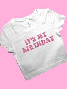 It's My Birthday SNUG FIT Crop Top | Crop Top | Graphic Top | Gift For Her | Y2K Baby Tee | Y2K crop top | Gift for friend Comfy Top to Lounge in! Actual item may be lighter/darker than pictured. M A T E R I A L S - SNUG FIT - 100% RING SPUN COTTON - Shoulder Taping S I Z I N G - Size chart is available on our listing photos. S H I P P I N G  &  P R O D U C T I O N  T I M E - Production Time is 2-3 Business Days. (May be delayed during the Holiday Season) - Shipping Time is 2-5 Business Days. (M Tight Crop Top, Custom Birthday Shirts, Y2k Crop Top, Trendy Crop Tops, Birthday Fits, Graphic Crop Top, Baby Tees Y2k, It's My Birthday, Y2k Baby Tee