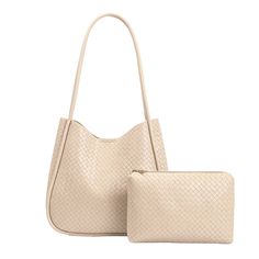 The Mischa by Melie Bianco is a double-handle tote bag made from recycled vegan leather and non-toxic hardware. The front and back feature an embossed woven print. Includes a removable zip pouch to keep your most important belongings secure. Recycled Vegan Leather 11"W x 10"H x 2.5" D Handle Drop: 12" Magnetic Closure Gold-Hardware Interior Zip Pocket Exterior Slip Pocket Removable Zip Pouch Unlined Fits up to a standard-size tablet Thml Clothing, Vegan Tote Bag, Vegan Leather Tote Bag, Vegan Leather Tote, Jewelry Tree, Medium Tote, Zip Pouch, Leather Tote Bag, Magnetic Closure