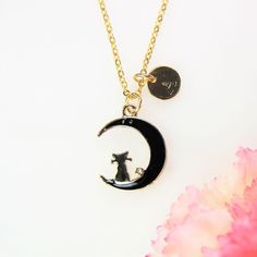 ♥ Black Cat on the Moon Charm Necklace Cat Lover Necklace Cute Cat Charm Crescent Moon with Cat Charm Animal Gift Personalized Gift ♥ This is Beautiful Gold Black Cat charm with hand stamped initial charm on a stainless steel chain, You able to choose initial from a drop down menu, ♥ You will receive 1 Necklace ♥ Alloy Charm Cat on the Moon Gold Plated Black Enamel Lead & Nickel Safe about : 20.5x16x2 mm ** Conversion: inch = 25.4mm or 1 mm = 0.0393 inches** ♥ Stainless steel chain 18 inches Black Themed Jewelry For Valentine's Day, Themed Black Jewelry For Valentine's Day, Whimsical Black Jewelry For Gifts, Themed Black Jewelry As Gift, Themed Black Jewelry Gift, Black Jewelry For Valentine's Day Birthday, Black Jewelry For Birthday On Valentine's Day, Cat On The Moon, Lover Necklace