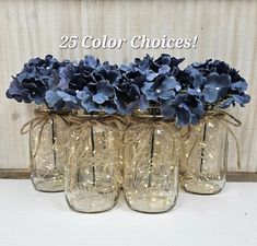 three mason jars with blue flowers in them and the words 25 color choices below it