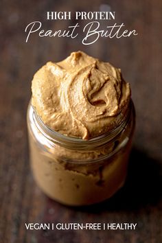 a jar filled with peanut butter on top of a table