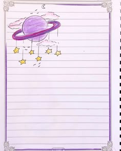 a notebook with an image of the planets and stars on it, as well as writing paper