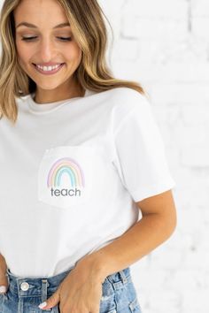 "Teachers--thank you for making a difference every day! We appreciate you! Treat yourself to this adorable pastel rainbow pocket tee! This super soft tee would also make the perfect gift to the favorite teacher in your life! Kaylyn is a size 4/6, 5'5\" tall, and she is wearing a size SMALL. All sales are final due to customization of product. Will ship USPS or UPS unless requested otherwise. Colors may differ slightly from appearance on screen. Find us on Facebook at www.Facebook.com/ardenandgol White T-shirt With Side Pockets For Everyday, Everyday White T-shirt With Side Pockets, Everyday Multicolor Cotton T-shirt, Multicolor Cotton T-shirt For Everyday, White T-shirt With Pockets For Everyday, Cute Rainbow Crew Neck T-shirt, Cute Rainbow Print Short Sleeve T-shirt, Cute Crew Neck Top With Pockets, Cute Rainbow Short Sleeve Tops