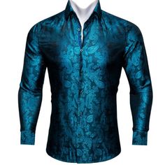 This is the perfect shirt for any man who wants to look stylish and sophisticated. The paisley print is elegant and timeless, and the shirt fits comfortably and looks great on anyone. Whether you're dressing up for a special event or just want to feel your best, this is the shirt for you. Handmade 100% Silk Paisley Dry Clean Only - 30-DAY MONEY-BACK GUARANTEE - Try it! If you don't love it, send it back. We offer free shipping on returns and exchanges. Take your time! You've got 30 days to decid Formal Long Sleeve Paisley Print Shirt, Elegant Paisley Print Button-up Tops, Elegant Button-up Dress Shirt For Party, Elegant Long Sleeve Shirt With Paisley Print, Elegant Summer Shirt With Paisley Print, Elegant Formal Paisley Print Top, Elegant Paisley Print Formal Top, Elegant Long Sleeve Paisley Print Tops, Formal Fitted Shirt With Paisley Print