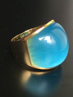 This is a perfect and unique magic  ring made of blue cat eye stone, gold 18K, the powerof the ring is used as a talisman for protection against misfortunes and various disasters. Used in conjunction with meditation to make contact with the mind.  The ring showcases an elegant design with rare style amulet ring. It is great to get this ring for your loved one or treat yourself for a classic timeless style.  Brief Story: It is a crystal in the quartz group. It can be called many names, cat's eye Amulet Ring, Stone Magic, Cat Eye Stone, Blue Cat Eye, Thai Buddha, Cats Eye Stone, Timeless Classic Style, Like A Cat, Blue Cat