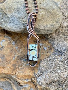 This listing is for a beautiful wire wrapped Giraffe Turquoise and copper pendant. This stone is so beautiful!  Sourced in Hubei, near the famous Yungai... this Turquoise was purchased from Turquoise Moose which is always authentic, and all natural. This pendant measures 1/2 inches in width, and 2 and 1/4 inches in length from the bottom to the top of the bail. I have wrapped this beauty in solid copper wire, and oxidized and polished it to bring out the natural copper highlights. Also included Wire Wrapped Turquoise, Copper Highlights, Copper Pendant, Copper Pendants, Turquoise Pendant, Ball Chain, So Beautiful, Copper Wire, Wire Wrapped