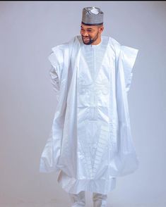 Step into the world of African tradition and sophistication with our exquisite Agbada African attire, a garment that embodies the rich heritage and artistry of African culture. This versatile attire is perfect for a wide range of special occasions and celebrations, where it adds an aura of regal elegance to your presence. Product Information: Complete Ensemble: The Agbada comes as a complete set, including a matching shirt and pants, allowing you to effortlessly achieve a cohesive and stylish lo Elegant Ceremonial Set For Eid, Ceremonial Elegant Sets With Traditional Drape, Ceremonial Sets With Traditional Drape In Elegant Style, Elegant Sets For Eid And Traditional Ceremonies, Elegant Dabka Embellished Thobe With Traditional Drape, Elegant Fitted Thobe For Wedding, Elegant Fitted Wedding Thobe, Elegant Formal Kurta With Traditional Patterns, Elegant Formal Thobe With Dabka