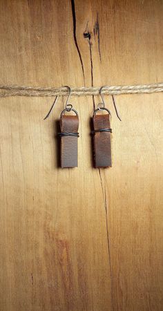 Brown and copper leather wire wrapped earrings, leather earrings by TibbylouCreations on Etsy Handmade Minimalist Leather Earrings, Minimalist Leather Earrings For Everyday, Rustic Leather Jewelry With Waxed Finish, Brown Leather Minimalist Earrings, Minimalist Brown Leather Earrings, Wrapped Earrings, Iron Wire, Wire Wrapped Earrings, Black Iron