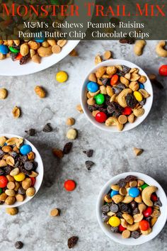 three white bowls filled with monster trail mix