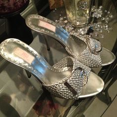 New Never Worn Glitzy J Lo Evening Or Dress Slip On Heals/Slides., These Are A Beautiful Open Toe Woven Silver Metallic Leather And Rhinestone Detailed Silver Buckle. 4 Inch Heal Size 7 1/2 Any Wear Was From Nordstrom Rack Try On. On Sole Pad. Heal Tab Perfect. $35 (Payed $79 New) Elegant Rhinestone Slip-on Heels, Glamorous Slip-on Evening Heels, Glamorous Evening Slip-on Heels, Chic Cocktail Heels With Bling, Chic Bling Heels For Cocktail, Silver Slip-on Evening Heels, Elegant Embellished Slip-on Heels, Luxury Bling Heels For Night Out, Party Embellished Slip-on Heels