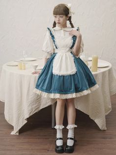 This delightful ensemble combines the classic Lolita aesthetic with a touch of maid-inspired charm, perfect for those who adore intricate, vintage-inspired fashion. The detachable beige apron is adorned with a lovely heart motif, adding a whimsical touch to the overall look. It&#8217;s perfect for adding a layer of cuteness and functionality. Pair it with a petticoat for a voluminous, traditional Lolita look, or wear it as a standalone piece for a more casual, yet still adorable, outfit. Kawaii Pinafore Dress, White Sleeveless Kawaii Dress, Blue Sleeveless Kawaii Dress, Alice Costume, Classic Lolita, Bittersweet Lolita, Vintage Inspired Fashion, Summer Blouses, Lace Ruffle