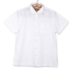 In solid white this collared men's shirt is crafted from a cotton and linen blend. Indian artisan Sandip Agarwal designs this bold and casual shirt which features short sleeves a left-side chest pocket and a button-up front. Side Chest, Go To New York, Women Encouragement, Rayon Dress, Children Clothes, Men Shirt, Classic Man, Casual Shirt, Sleeve Cotton