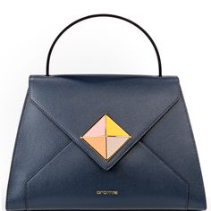 Made From The Highest Quality Materials, This Sophisticated, Fashionable, And Iconic Handbag Will Be Your New Fashion Favorite. Made From 100% Genuine Italian Leather * Micro Print Calfskin Leather Construction * Gold Toned Hardware * Flap Twist Lock Closure * Exterior Features An Enameled Prism That Enhances Bag Shape * Interior Features 1 Zip Pocket And 2 Slip Pockets Combined * Polyester Lining * Protective Feet * Color: Blue * Dimensions: 12.5" W X 8.5" H X 5.5" D * 4" Handle Drop * 23.5 Blue Evening Shoulder Bag With Top Handle, Blue Top Handle Shoulder Bag For Evening, Modern Blue Evening Bags, Modern Blue Formal Bag, Modern Blue Evening Shoulder Bag, Chic Blue Evening Shoulder Bag, Chic Blue Bags For Formal Occasions, Chic Blue Shoulder Bag For Evening, Chic Blue Shoulder Bag For Formal Occasions