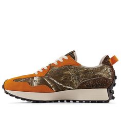 If you're looking for a sneaker that can take you from the city to the great outdoors, then you need the Realtree x atmos x New Balance 327 'Camo' in your life. This progressive lifestyle runner features a hunting and outdoor theme, highlighted by a Realtree EDGE camouflage pattern throughout the canvas upper. Contrasting orange accents add a pop of color, while the hairy brown suede heel overlay and black 'N' logo give this sneaker a stylish edge. The EVA midsole provides lightweight cushioning New Balance Urban Sneakers For Outdoor, New Balance Urban Outdoor Sneakers, Urban New Balance Sneakers For Outdoor, New Balance Casual Outdoor Sneakers, Casual New Balance Sneakers For Outdoor, New Balance Brown Walking Sneakers, Custom High-top Sneakers With Rubber Waffle Outsoles For Outdoor, Brown New Balance Walking Sneakers, Brown New Balance Sneakers For Walking