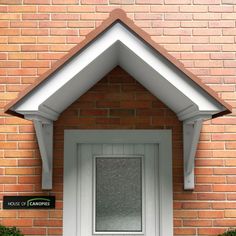 the front entrance to a brick building with two double doors and an arched arch above it