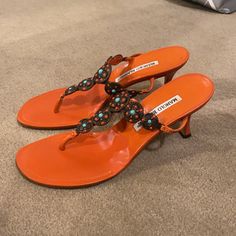 Beautiful And Vibrant Orange Leather Sandals From Manolo Blahnik Thing Strap Sandal, Turquoise And Orange Detailed Hardware Great Condition Manolo Blahnik Shoes, Orange Leather, Vibrant Orange, Strap Sandals, Manolo Blahnik, Blue Orange, Leather Sandals, Women's Shoes Sandals, Shoes Sandals