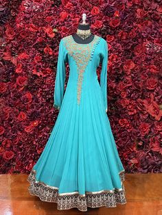 Go all out in this beautiful Anarkali, which is sure to bring out the innate grace and grandeur in you! Color -Dark Turquoise Blue Fabric & Work Style - - Soft Lycra stretchable fabric. Details - - Assured quality - Wash care instruction: Dry clean only. - Slight variation in color is possible due to digital photography. Floor-length Blue Kurta With Zari Work, Blue Maxi Length Sharara With Cutdana, Blue Floor-length Kurta With Zari Work, Blue Zari Work Anarkali Set Maxi Length, Blue Floor-length Georgette Kurta, Blue Anarkali Churidar With Cutdana, Anarkali Blue Churidar With Cutdana, Blue Floor-length Salwar Kameez For Navratri, Elegant Blue Churidar With Cutdana