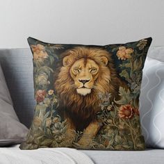 a painting of a lion surrounded by flowers and leaves on a black background throw pillow