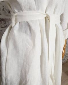 White linen bath robe.This wrap style linen bath robe is made of stonewashed middle weight highest quality soft 100% linen.Lightweight kimono style robe is with pockets and has adjustable ties for best fitting.Composition: 100% natural softened 200gsm 7oz linenPlease choose a size and length :Back length:short - 90cm (35") middle - 105cm (41") long - 120cm (47") Sleeve length from neckline 73cm (29")XS-M or L-XLIf you need other size, please contact us.Linen care:- washing up to 40°C in washing Beige Linen Robe For Spring, Long Linen Robe For Spring, Long Linen Summer Robe, Summer Long Linen Robe, Spring Beige Linen Robe, Summer Linen Robe With Long Sleeves, Elegant Summer Linen Robe, Linen Wrap Robe For Beach, Linen Wrap Robe For The Beach