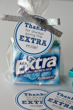 there are two stickers that say thank you for always going the extra mile and next to each other