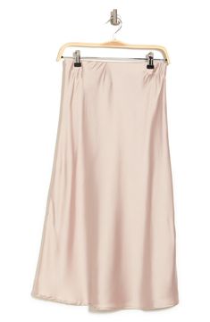 Elevate your wardrobe with this pull-on bias satin midi skirt for elegant, feminine style. 31" length (size S) Elasticized waist Pull-on style Satin construction 97% polyester, 3% spandex Machine wash cold, line dry Made in USA Model’s stats for sizing: 5’10” height, 34” bust, 27” waist, 35” hips. Model is wearing size S. Relaxed Satin Pencil Midi Skirt, Relaxed Fit Satin Midi Pencil Skirt, Feminine Satin Flowy Skirt, Feminine Flowy Satin Skirt, Satin Midi-length Bottoms For Spring, Feminine Satin Skirt For Spring, Spring Satin Midi Bottoms, Feminine Satin Bottoms For Evening, Feminine Silk Maxi Skirt