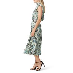 Green floral printed satin (100% Polyester). Hourglass. Sleeveless. High neckline. Hidden back zipper closure with button keyhole. Partially lined. 46" from shoulder to hemline. Imported. Safari Print, Rent The Runway, Closet Designs, High Neckline, Pleated Skirt, High Low Dress, Print Dress, Satin, Floral Prints