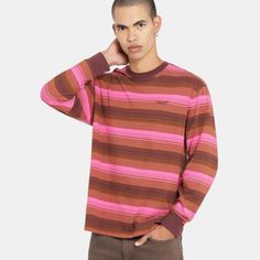 This Levi's T-Shirt Is A Must-Have For Any Stylish Man's Wardrobe. With Its Classic Crew Neckline And Long Sleeves, It's Perfect For Year-Round Wear. The Striped Pattern And Multicolor Design Make It A Versatile Piece That Can Be Paired With A Variety Of Outfits. The Relaxed Fit Ensures Comfort, While The Cotton Material And Machine Washable Care Make It Easy To Maintain. The Shirt Features A Levi's Logo Accent And Is Made Of Knit Cotton Fabric. It's A Regular Fit, Size S Shirt That's Perfect Fo Pink Long Sleeve Retro Top, Pink T-shirt For Fall Streetwear, Retro Pink Relaxed Fit Top, Pink Retro Relaxed Fit Top, Pink Retro Top With Relaxed Fit, Levis T Shirt, Levis Shirt, Shirt Making, Men's Wardrobe