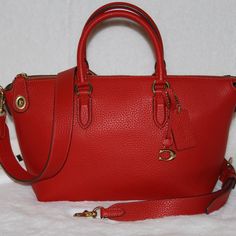 Coach Cara Satchel Sport Red Leather Shoulder Purse Handbag Brand New With Tag Attached Dust Bag Included Color: Sport Red Soft Pebble Leather Inside Zip, Cell Phone And Multifunction Pockets Zip-Top Closure, Fabric Lining Handles With 4 1/2" Drop Outside Zip Pocket Detachable Strap With 21 1/2" Drop For Shoulder Or Crossbody Wear Four Protective Feet At Base 10 1/2" (L) X 7 1/2" (H) X 5 1/2" (W) Ships Fast Same Day Or Next Day Shipping. From A Smoke Free Environment. Red Satchel With Handle Drop For Office, Coach Red Satchel With Detachable Handle, Red Coach Satchel, Red Coach Satchel With Top Carry Handle, Red Coach Shoulder Bag For Office, Coach Red Evening Bag, Red Coach Evening Bag, Coach Red Crossbody Satchel, Red Coach Crossbody Satchel