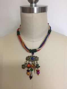 Vintage multi colored rope necklace. Beautiful Pendant. Measure approximately 21 inches. Pendant 3 inches long. Multi Strand Pearl Necklace, Colored Rope, Necklace With Pendant, Lattice Pattern, Polymer Clay Necklace, Clay Necklace, Rope Necklace, Crystal Flower, Hanging Pendants