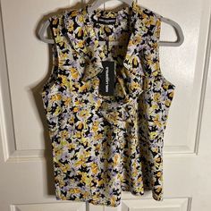 Karl Lagerfeld Paris Floral Ruffle Trim Sleeveless Tank Top Yellow Medium Nwt Features: Floral Print Ruffle Trim Sleeveless Pullover Style Condition: Nwt Yellow Sleeveless Top With Ruffles, Yellow Sleeveless Blouse For Work, Yellow Sleeveless Spring Blouse, Sleeveless Floral Print Blouse For Work, Yellow Sleeveless Blouse With Ruffles, Sleeveless Yellow Blouse With Ruffles, Multicolor Sleeveless Tops For Work, Trumpet Sleeve Top, Floral Lace Shorts