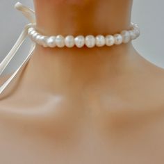 Handcrafted necklace choker, Freshwater pearls, double faced french silk velvet ribbon, finished with more pearl danglers. It's feminine, chic and stylish for the Bride to be or anyone loving pearls with a modern twist. Pearls measure between 15” to 16" in length Custom sizes available upon request Silk velvet double faced ribbon available in 3 colors Made with love in Los Angeles Complimentary gift wrapping provided All sales final. Elegant Wedding Choker With Ribbon, Elegant Wedding Ribbon Choker, Gift Pearl Choker With Chain Detail, Luxury Pearl Chain Choker Jewelry, Pearl Ribbon Choker, Ribbon Choker, French Silk, White Velvet, Velvet Color