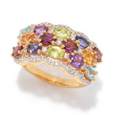 Compelling color and precious metal shine give this ring gorgeous impact when you slip it onto your finger! Luscious multi-color gemstones demand attention, accented by an array of white zircon. 18K yellow vermeil over sterling silver completes the stunning design. Pair it with earrings 199-928 for a coordinated look. Multicolor Diamond Gemstones With Accents, Wedding Rings With Multicolor Diamond Accents, Multicolor Diamond Accented Rings In Fine Jewelry, Multicolor Diamond Accented Rings Fine Jewelry, Luxury Multicolor Rings With Center Stone, Multicolor Diamond Accents Rings Fine Jewelry, Elegant Multicolor Cubic Zirconia Sapphire Ring, Multicolor Diamond Ring With Center Stone For Anniversary, Elegant Multicolor Sapphire Ring With Cubic Zirconia